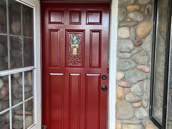 Detail painting services for commercial properties in El Dorado County Placer County CA by Dowell's Painting Painting a commercial front door